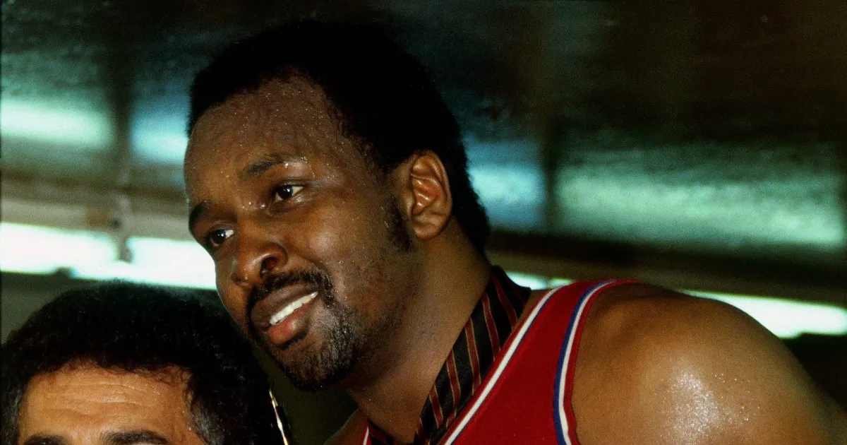 Moses interacting with a fan after game